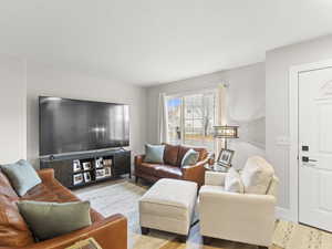 Living area featuring wood finished floors