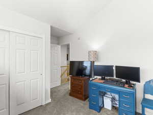 Office area with light colored carpet