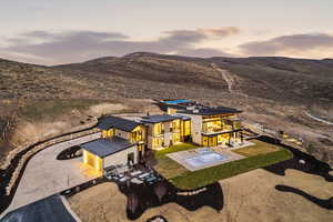 View from above of property featuring a mountainous background