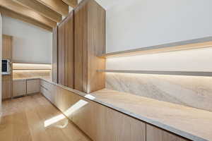 Sauna with hardwood / wood-style flooring