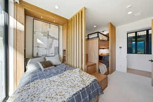 Bedroom with recessed lighting and carpet floors