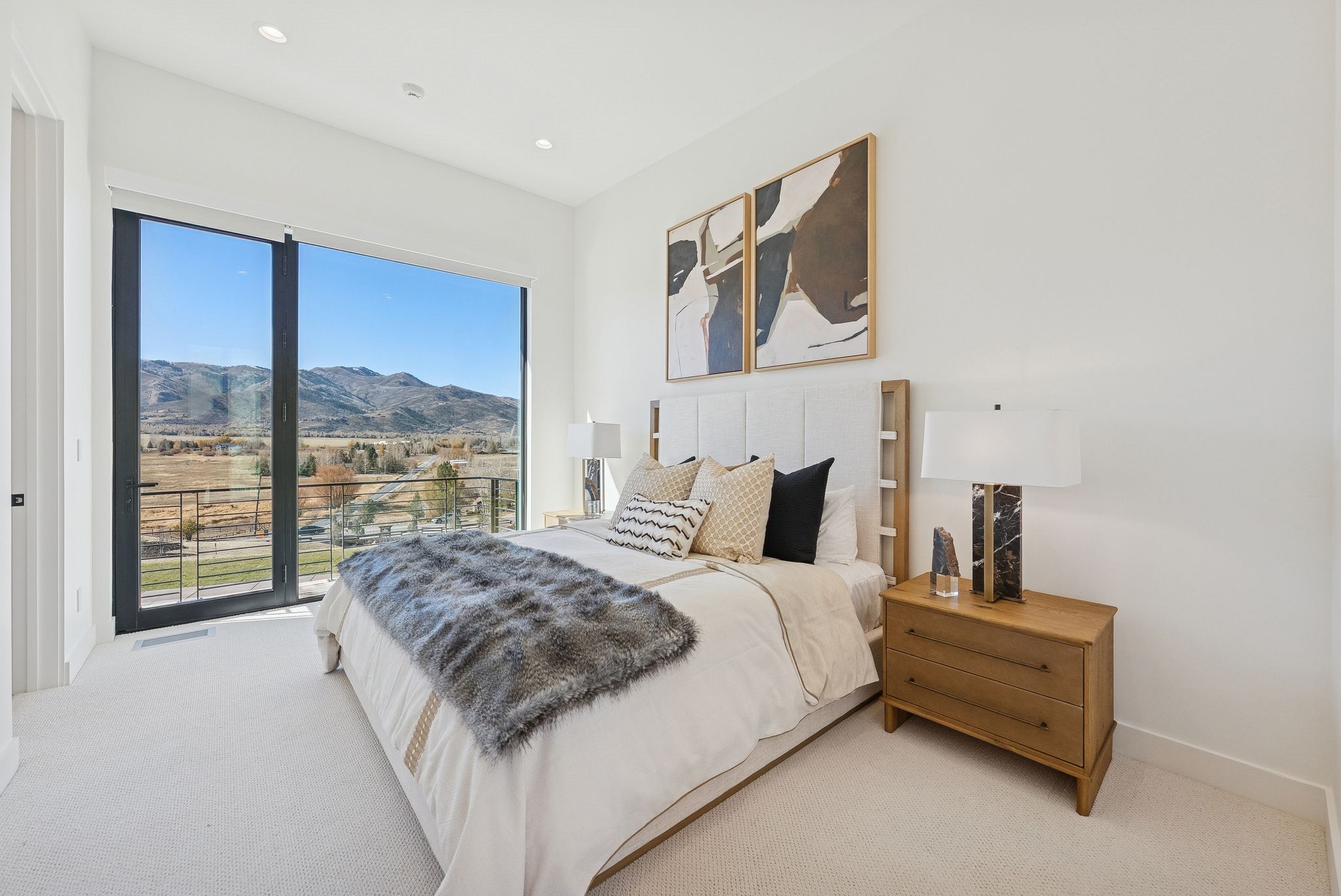 Bedroom with a mountain view, carpet flooring, and recessed lighting