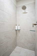 Bathroom with a tile shower