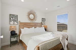 Bedroom with carpet flooring and recessed lighting