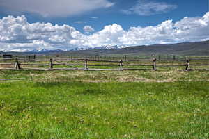 View of yard featuring a view of countryside and a mountain view