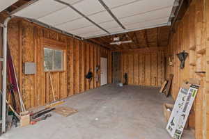 Garage featuring a garage door opener