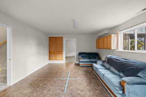 Living area featuring baseboards