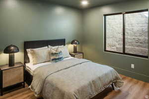 Bedroom featuring wood finished floors