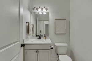 Bathroom with vanity and toilet