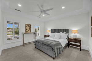 Carpeted bedroom with ceiling fan, recessed lighting, and ornamental molding