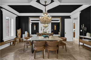 Dining space with a chandelier and ornamental molding