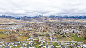 View of property location with nearby suburban area and a mountainous background