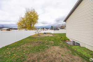 View of fenced backyard