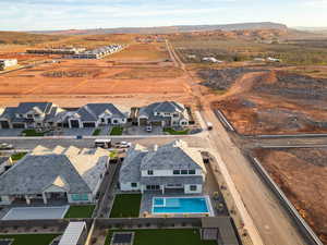 Aerial view of sparsely populated area featuring mountains and nearby suburban area