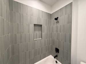 Bathroom featuring shower / bathtub combination