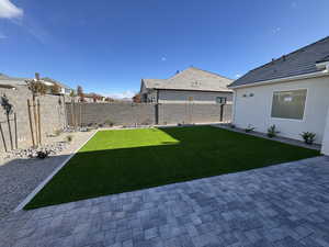 View of fenced backyard