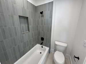 Full bath with bathing tub / shower combination and toilet