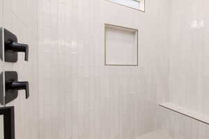 Bathroom with tiled shower