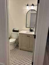 Bathroom with vanity and toilet