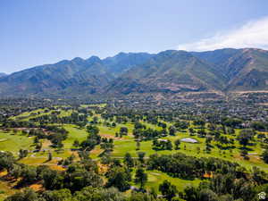 View of mountain background featuring a golf club