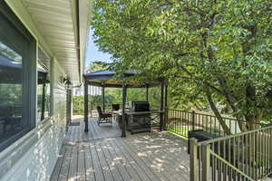 Wooden terrace with a gazebo