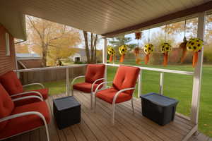 Wooden terrace with a yard