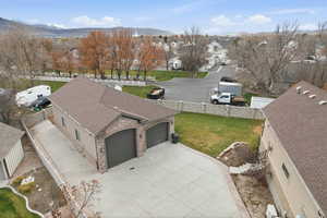 Aerial view of residential area featuring mountains