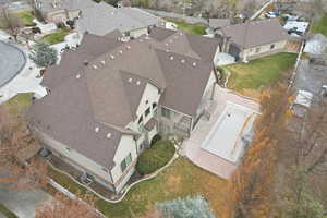 Aerial view of property's location featuring nearby suburban area