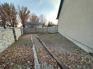 View of fenced backyard