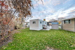 Rear view of property with a chimney
