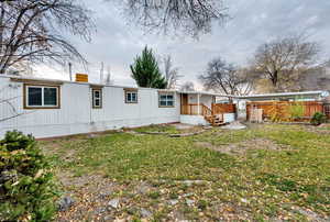 Back of property with a chimney
