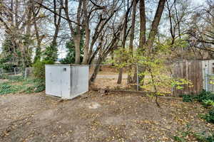 View of yard featuring an outdoor structure