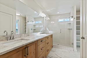 Master bath with walk-in shower upgraded quartz countertops and stunning tile shower