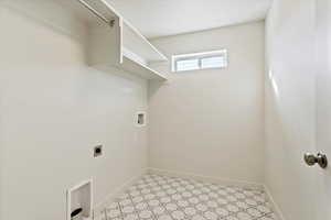 Laundry area with fun pattern tile floor