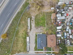 Aerial overview of property's location featuring nearby suburban area