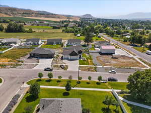 Aerial perspective of suburban area featuring a mountain backdrop