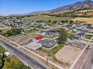 Aerial view of residential area featuring a mountain backdrop