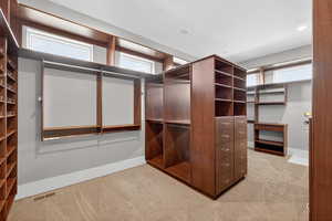 Primary Custom Closet with Washer & Dryer Hookups