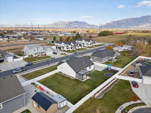 Aerial view of residential area with a mountain backdrop