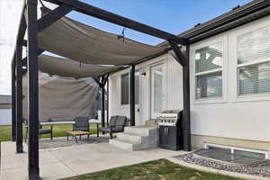 View of patio featuring grilling area