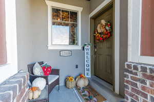 Inviting front porch featuring a beautiful view of the courtyard and mountains to the east.