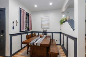 Dining area with custom craftsman detailing and ample space for a family size dining table.