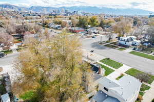 Aerial view of residential area featuring mountains