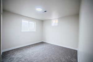 Spare room with carpet flooring and baseboards