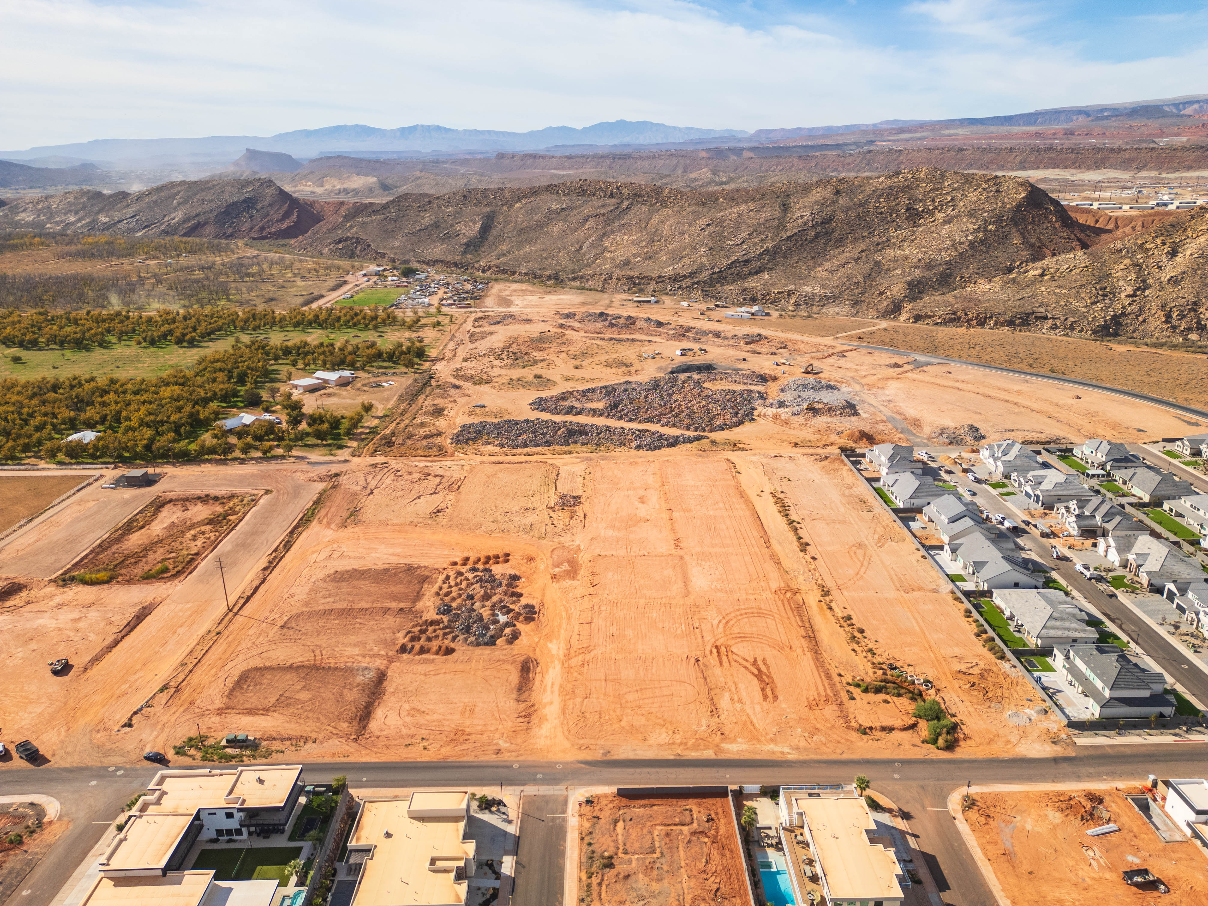 Aerial overview of property's location with mountains and rural landscape