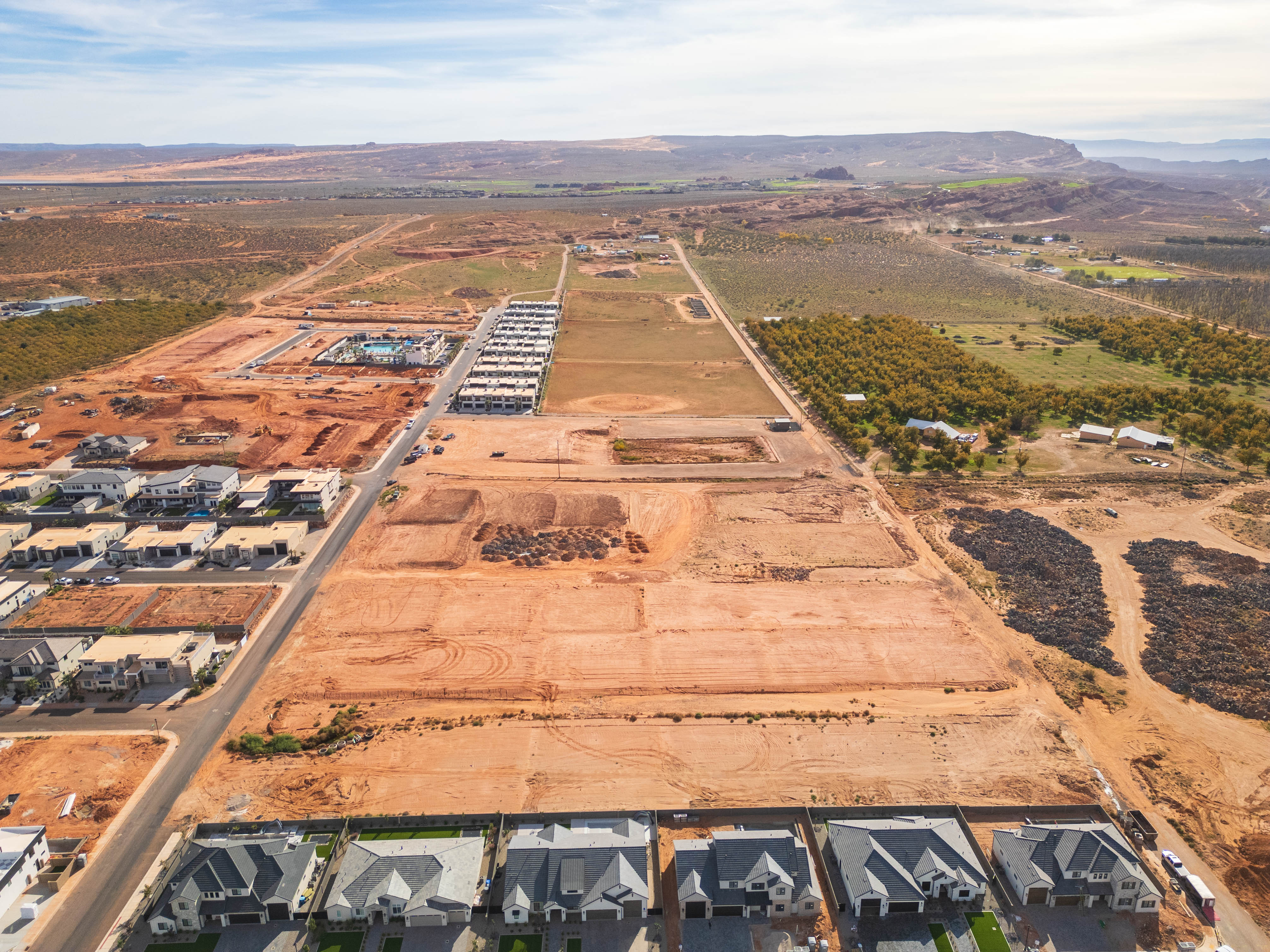Aerial view of property's location with rural landscape and nearby suburban area