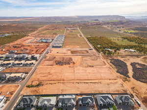 Aerial view of property's location with rural landscape and nearby suburban area