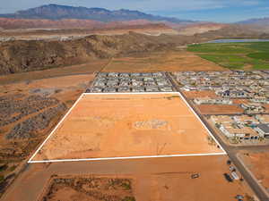 Aerial view of residential area featuring a water and mountain view