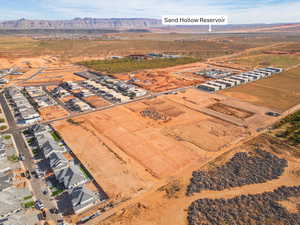 Bird's eye view of a mountainous background and a desert landscape