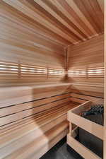 Sauna / steam room featuring chromotherapy lighting, and tile patterned floors